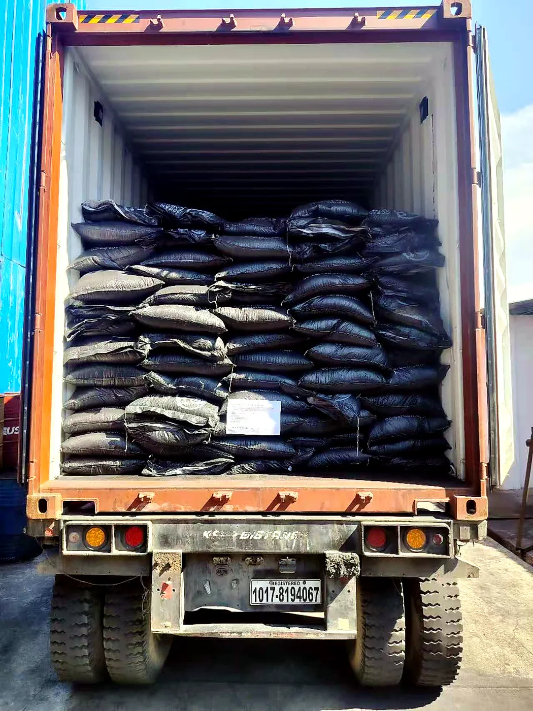 Activated carbon container shipment packaging